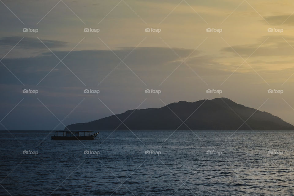 Fisherman's boat in the dam