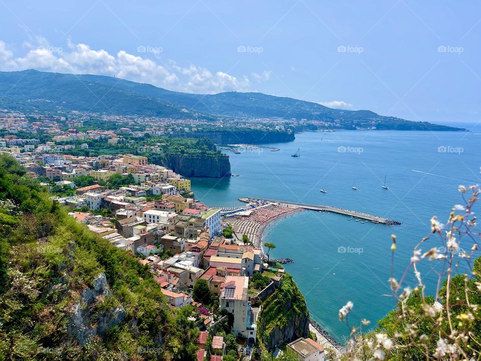 Scenic island coast outlined by water and mountains