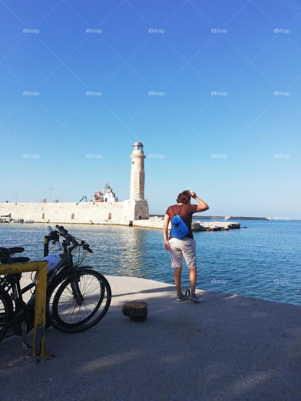 woman against lighthouse