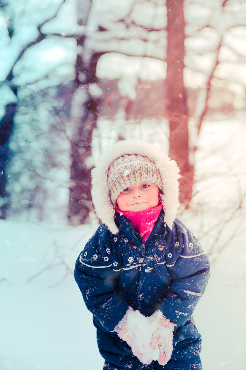 Winter with friends. Spending wintertime outdoors playing with snow