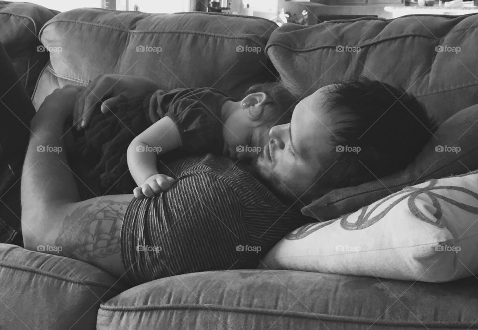 Father and daughter sleeping