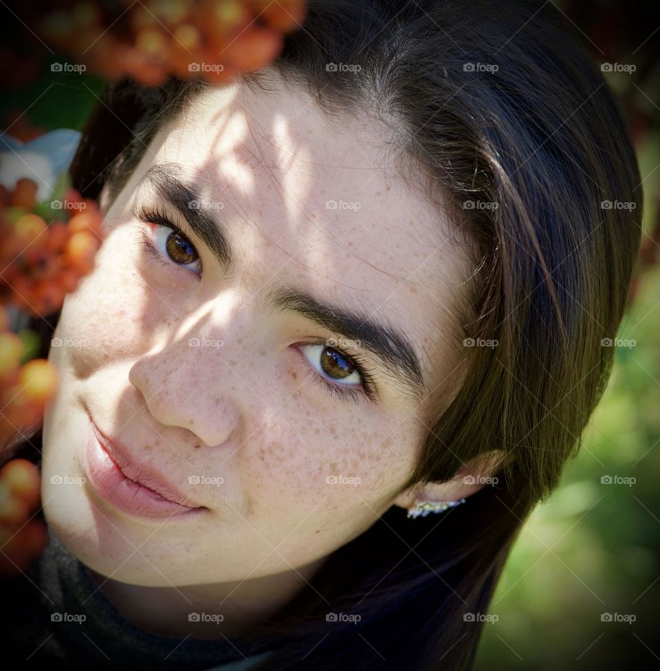 Beautiful girl looking up 