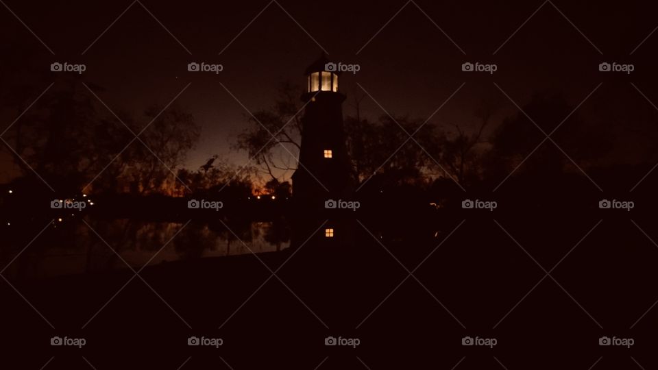 Total night is here and the Lighthouse is lit and doing the job needed. Some tiny bits of color and reflection is left of the day. 