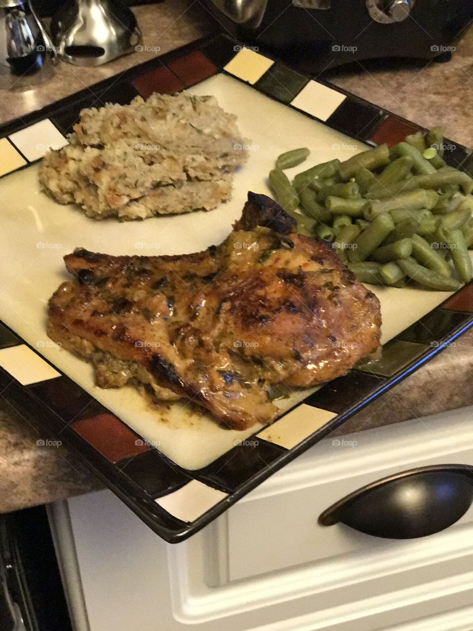 Pork chops stuffing and green beans 