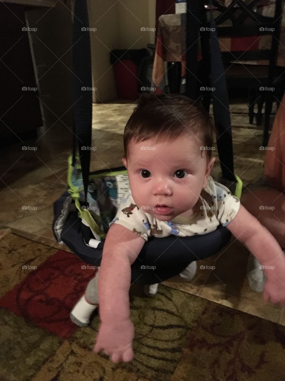 My grandson in his bouncer❤️