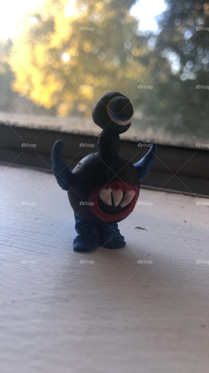 $pooky $zn.  My brother and I had clay and we made monsters. This was mine lol. Inspired by Mike Wazowski😂
