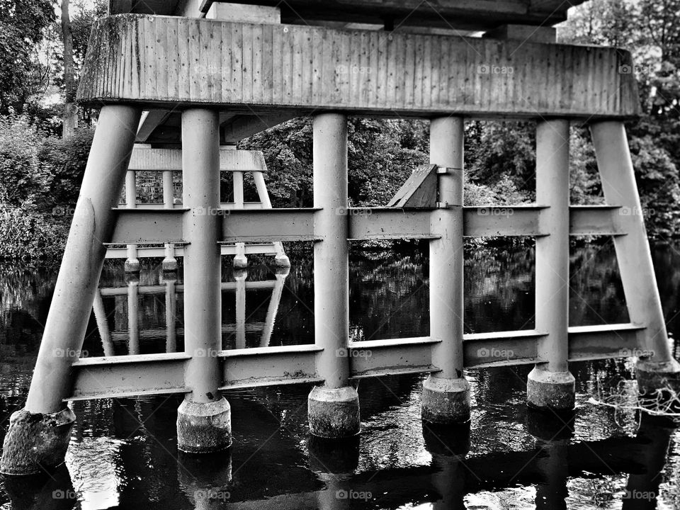 Foundation of a stone bridge in the Rhine in black and white