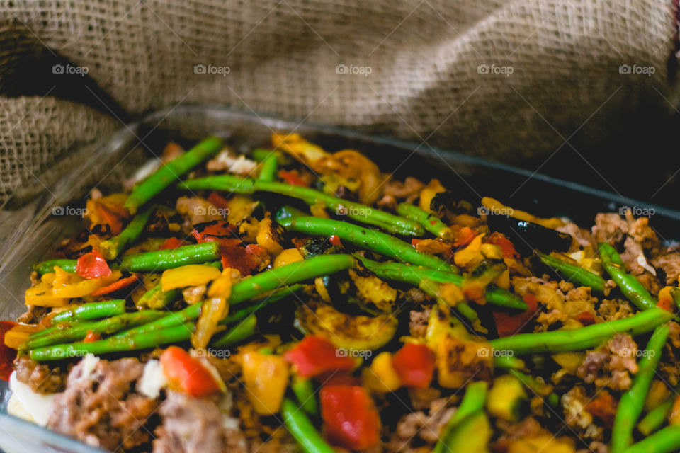 casserole with pasta, cheese, meat and fresh vegetables