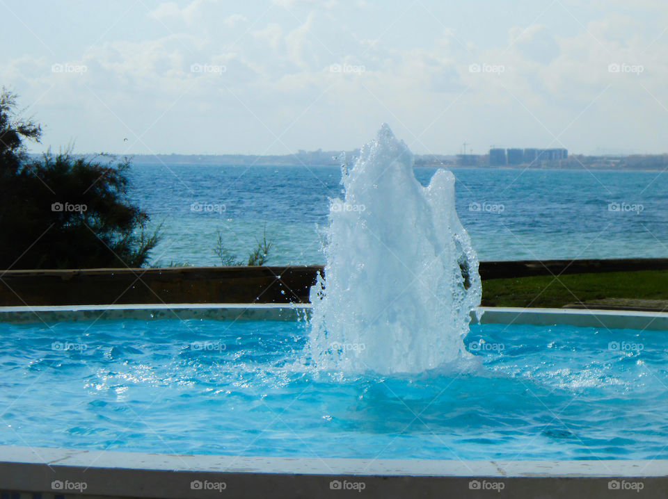 A fountain by the sea