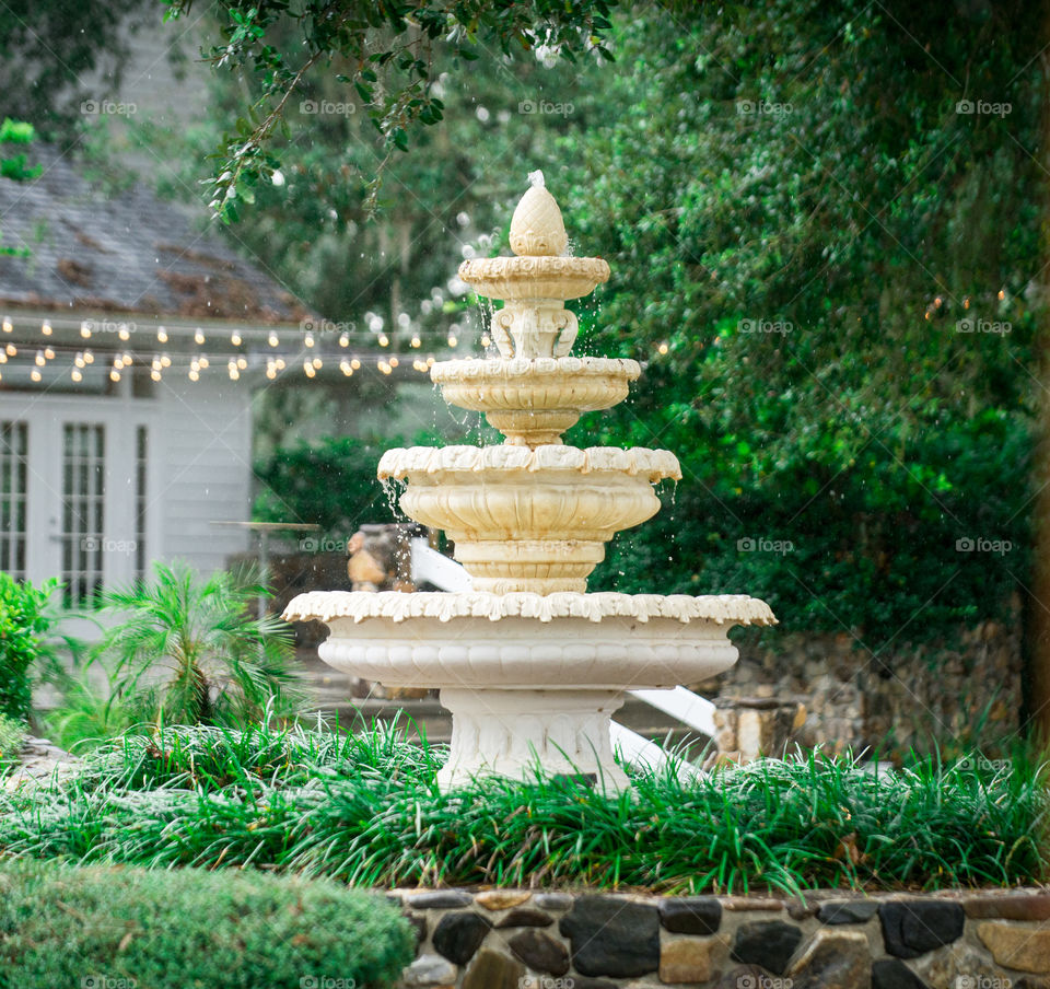 white four tier fountain
