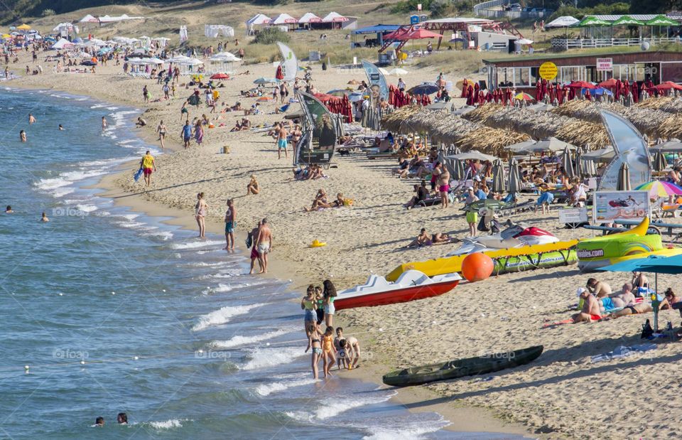 Seaside, summer vacation, people on the beach