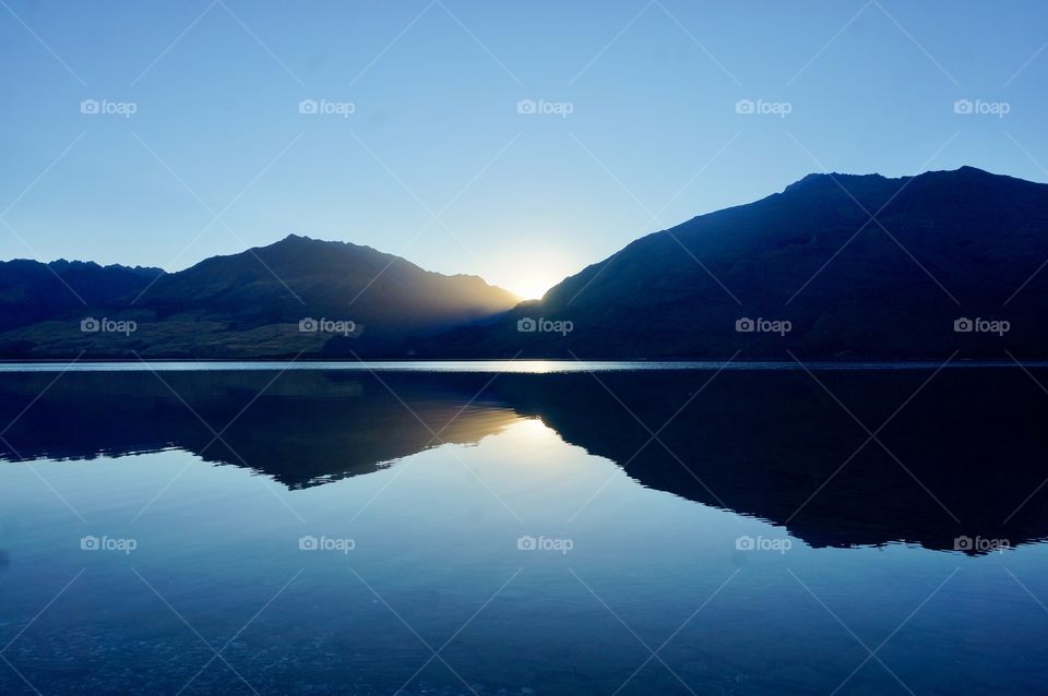 Reflection. Mirror lake, sun. New Zealand 