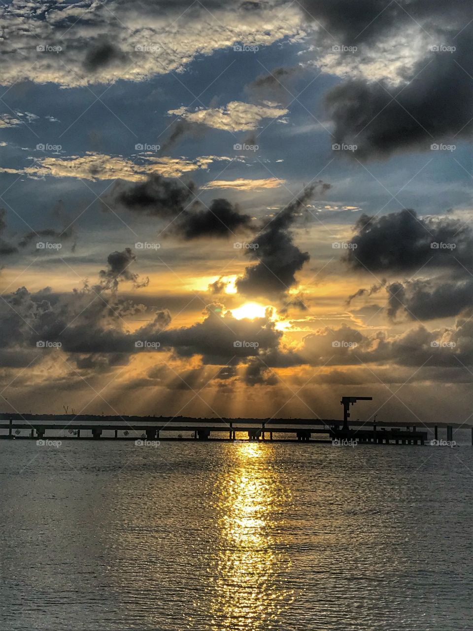 Watched the sunset over the harbor as we walked along a pier 