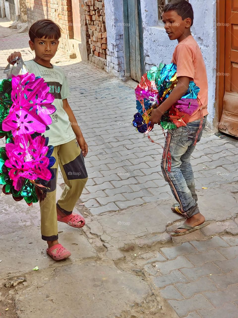 Children playing with some plastic material