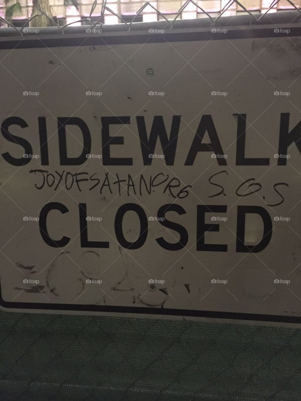 Urban Renewal. A new retail project in Downtown LA has closed the sidewalk.  I watched a tagger walk by and write on the sign!!
