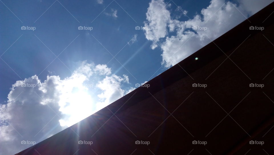 Sun is shining in front of the clouds.