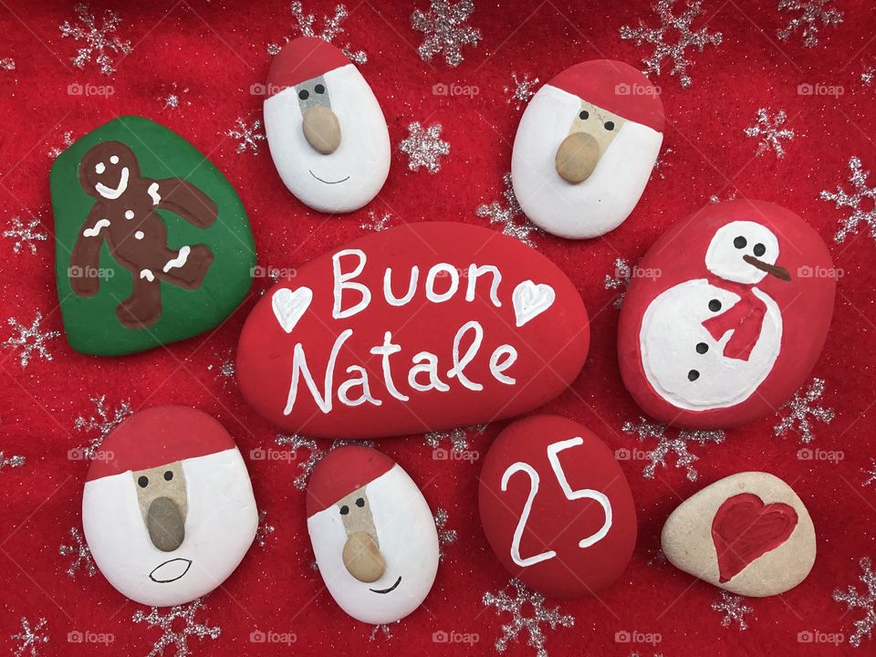 Buon Natale on colored stones 