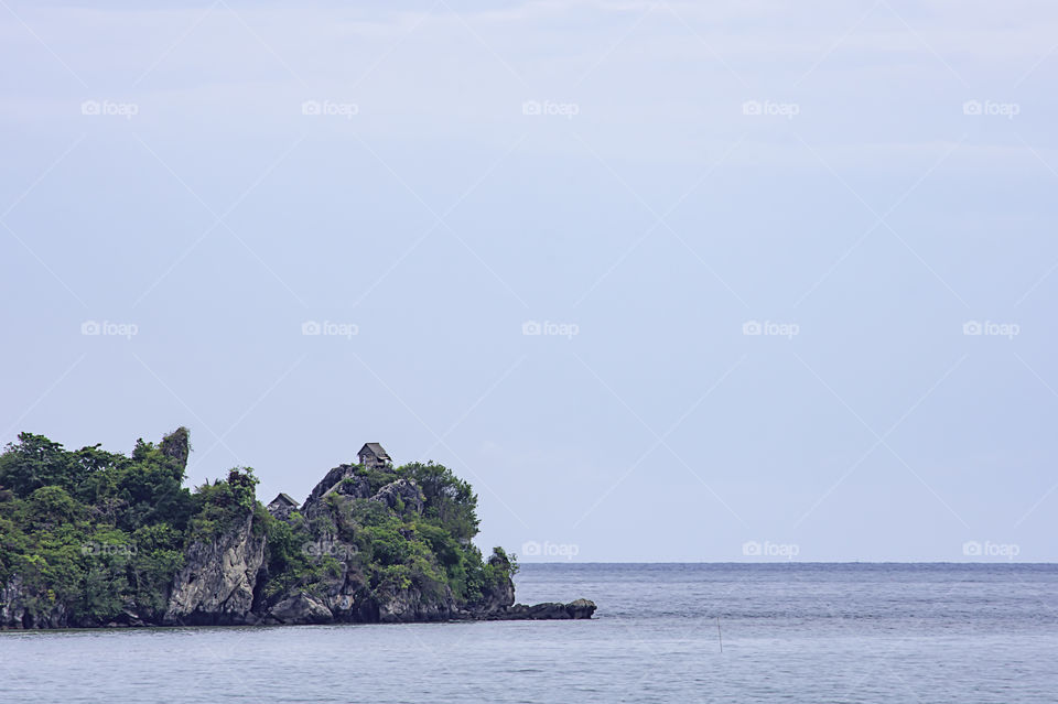 Wooden houses built on rocks in the koh Maphrao at Chumphon in Thailand.