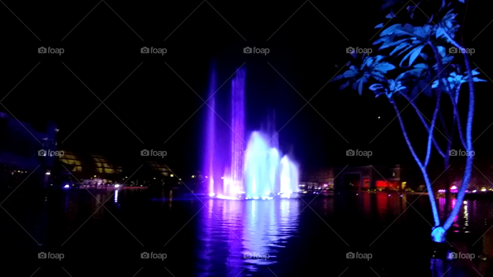 neon fountain show at Okada hotel and casino