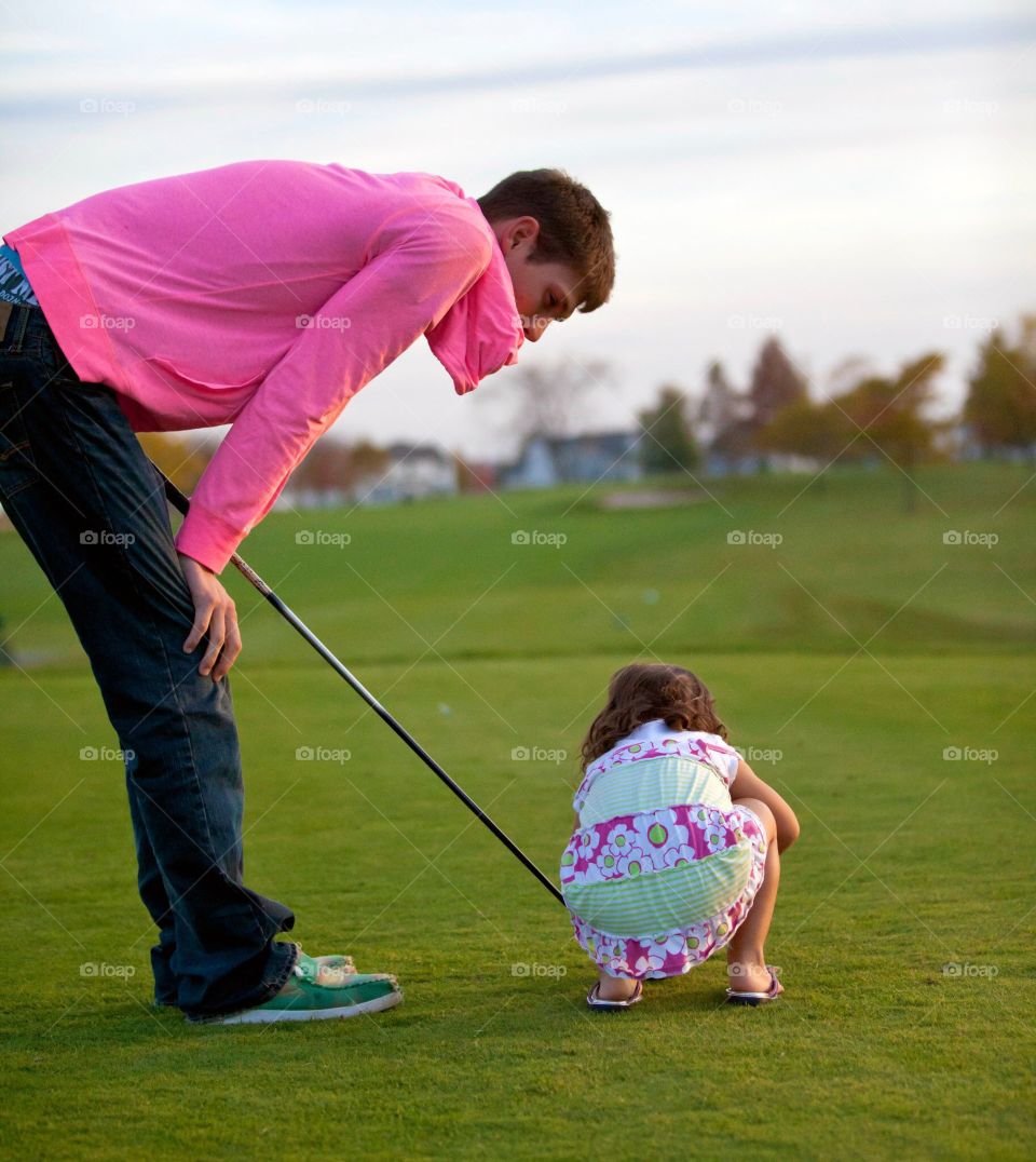 Daddy and Daughter Golfing