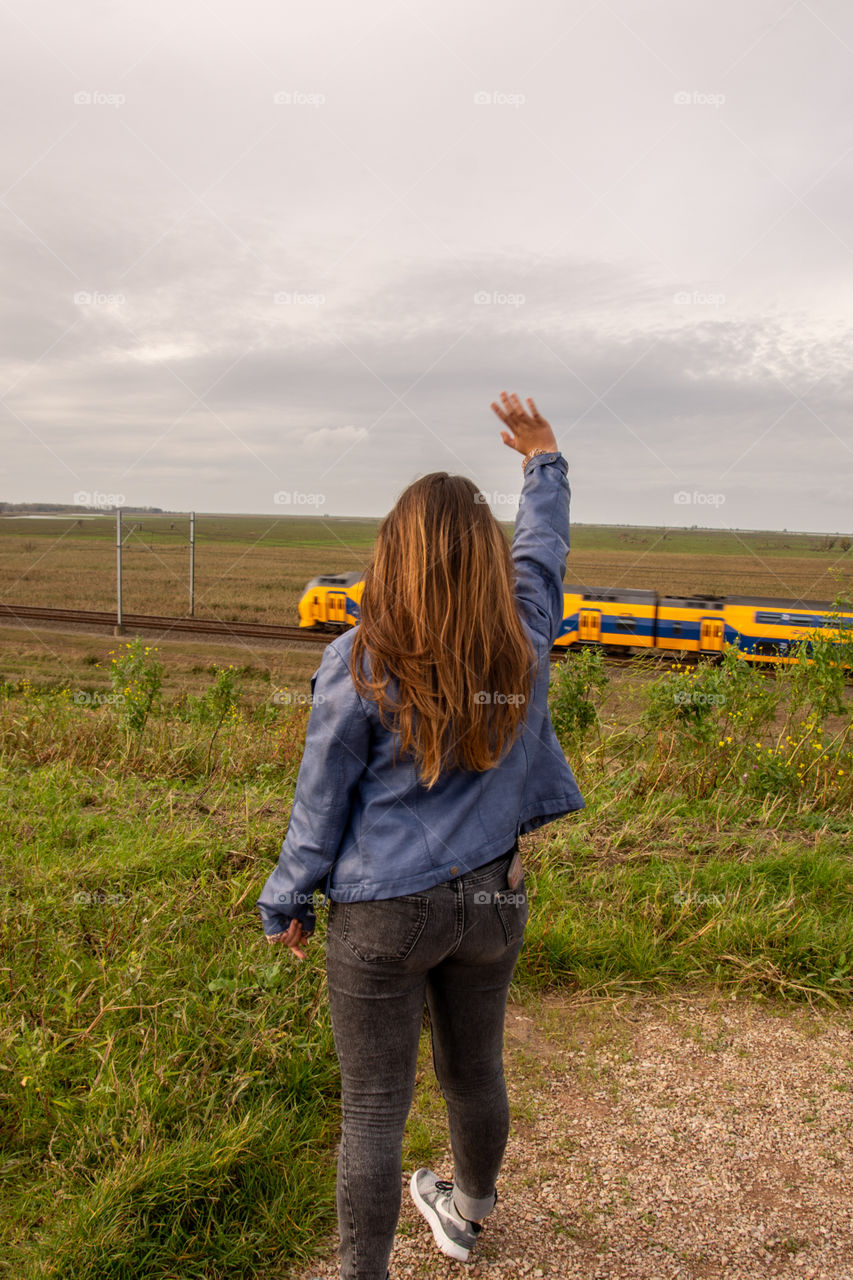 Waving to the train