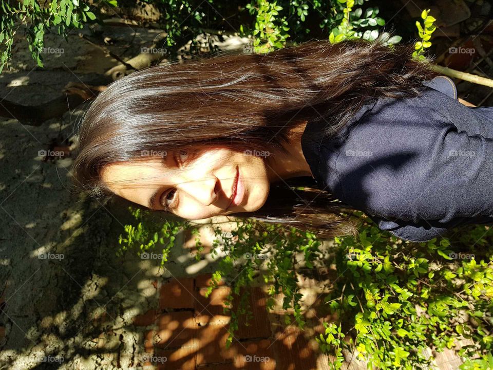 Sweet smile. Brazilian girl. Trees. Good vibes.