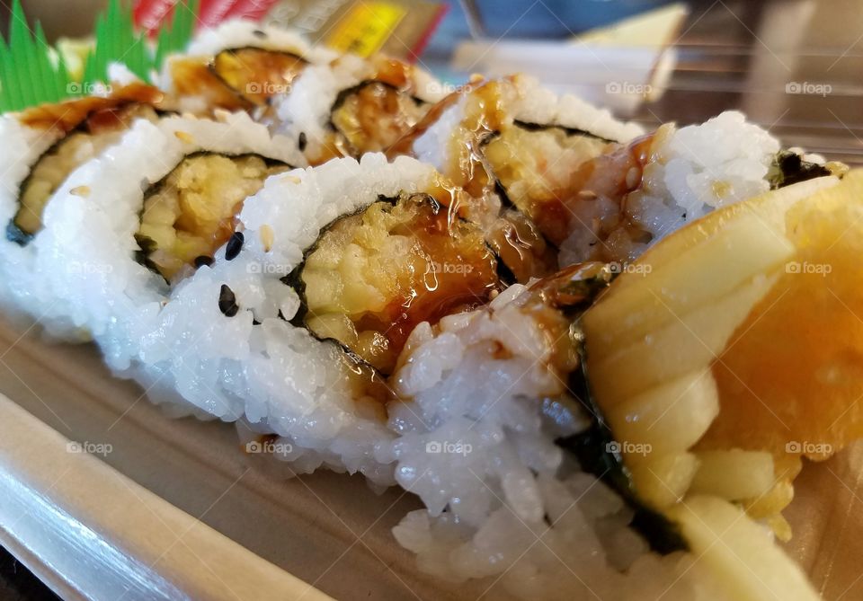 Extreme close-up of tempura shrimp sushi