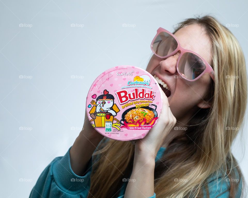 Ramen Love, Woman playing with product