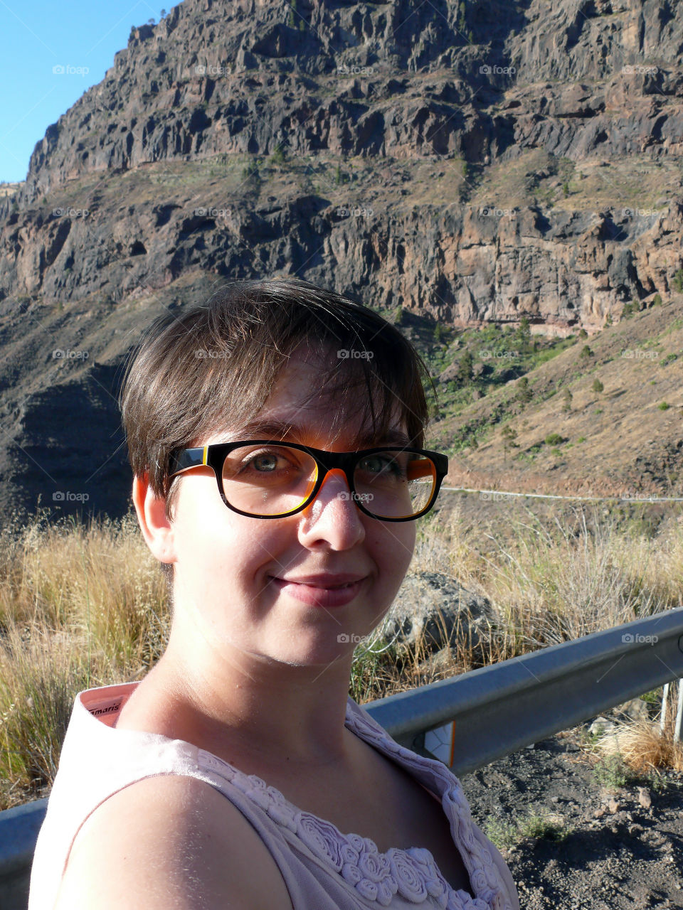 Headshot of young woman being outdoors on Gran Canaria, Las Palmas, Spain.