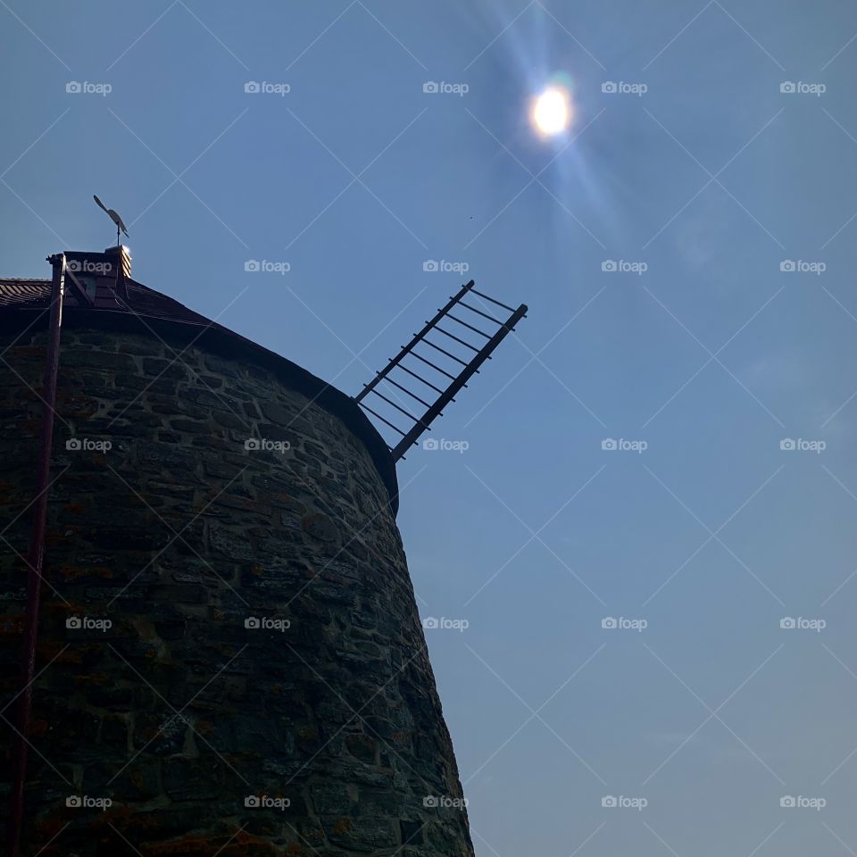 Magnificent view of the sun and the mill, Quebec, Canada 