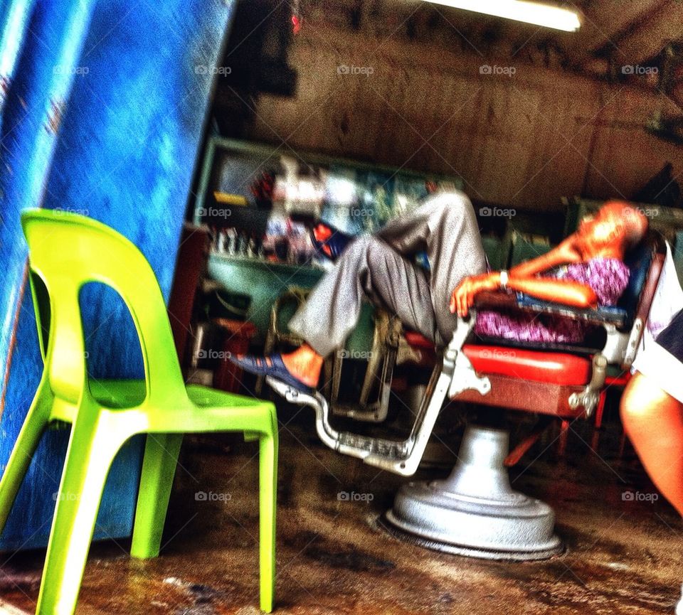 A barber in a barbershop