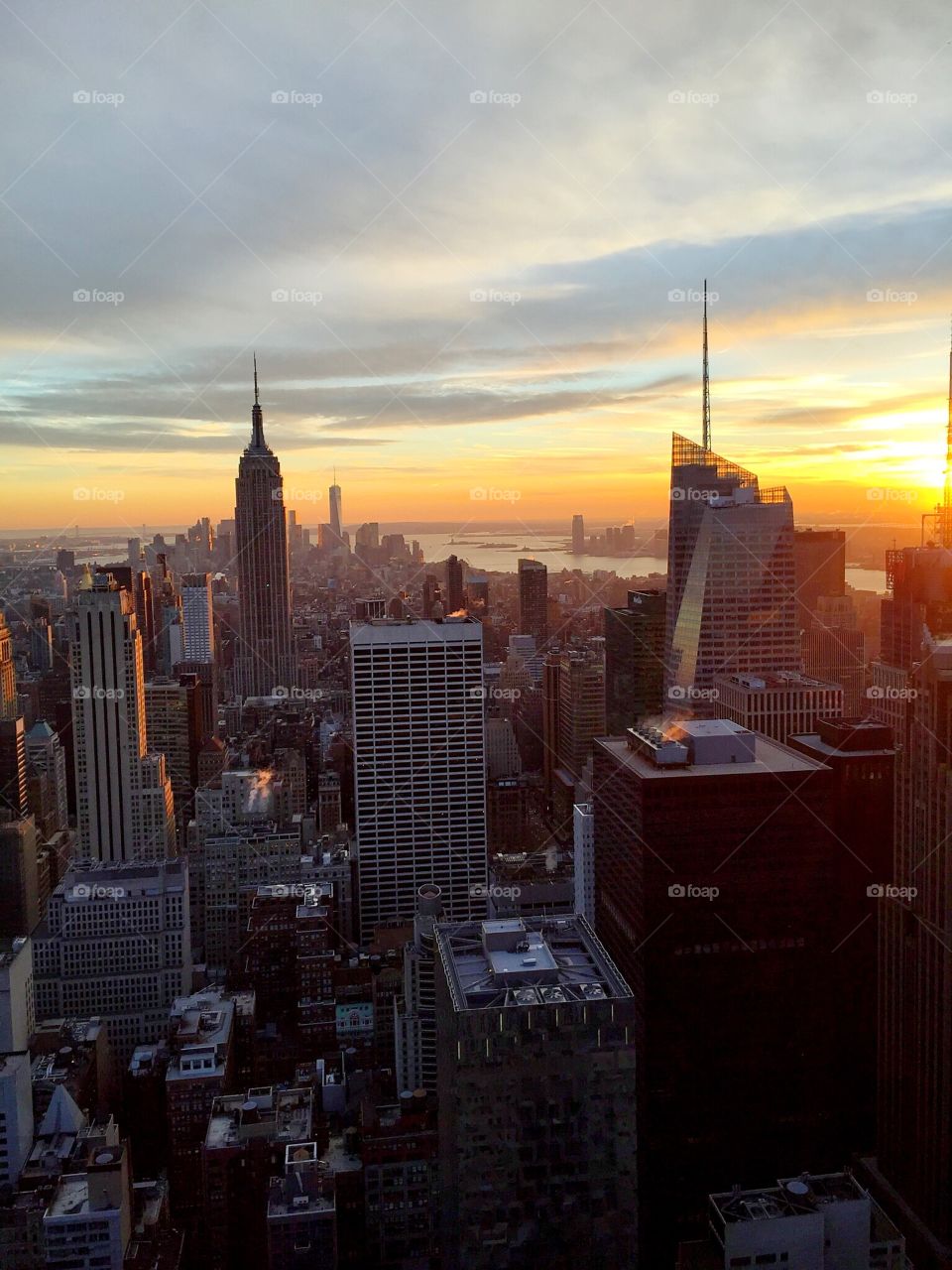 Empire state building and towers in city