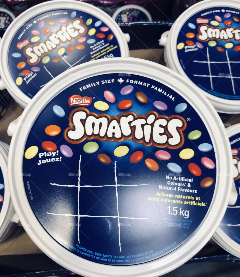Some Circular Shaped, Family Size Buckets Of Smarties