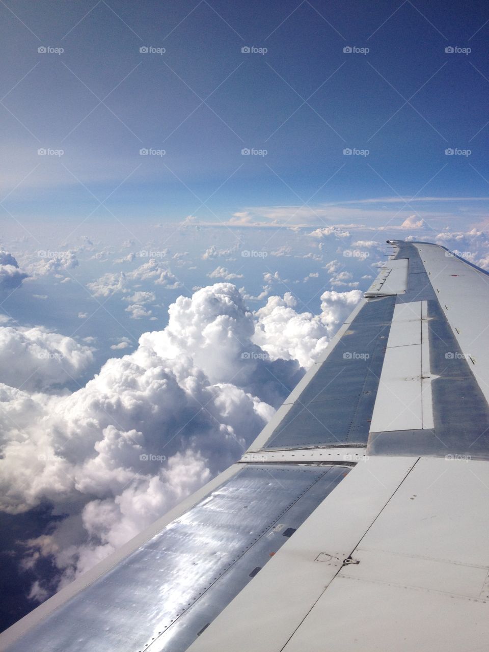 Airplane ride in the window seat. 