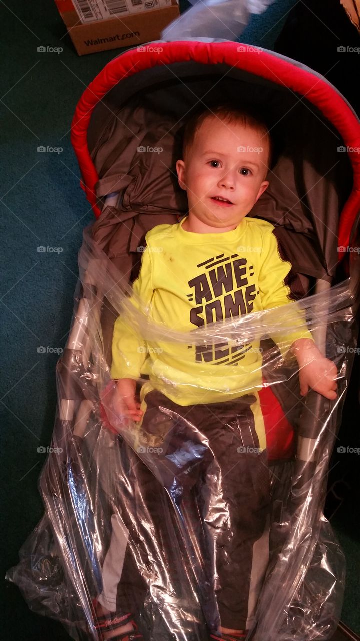 cute kid inside a plastic bag