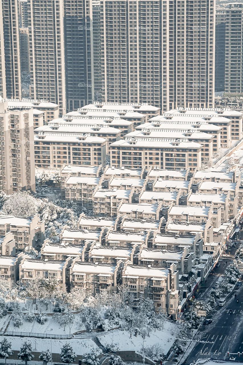 Residential buildings covered by snow in China