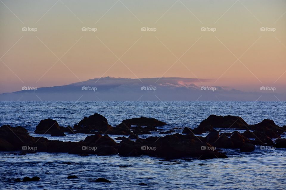 sunset over the atlantic ocean coast on la gomera canary island in Spain