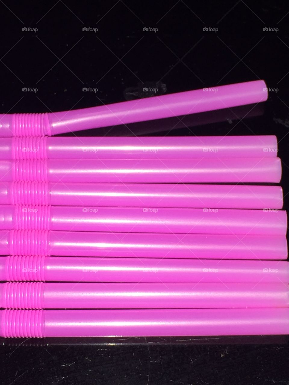 Detail of purple plastic straws