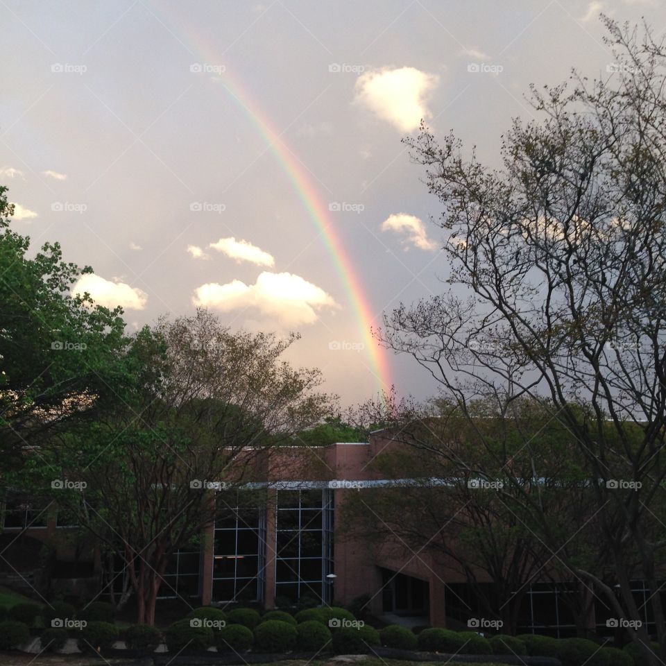 Rainbow over Brick Building