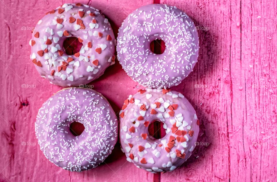 Doughnuts on a pink background