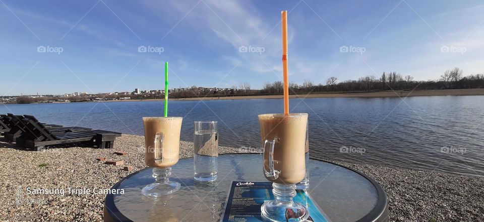 coffee for two on the lake on a beautiful sunny day