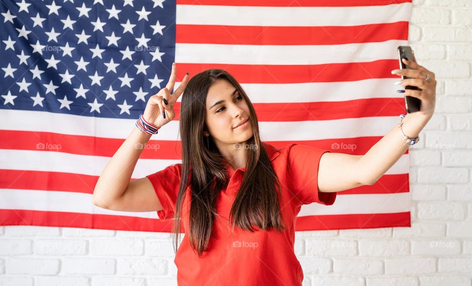 woman holding USA flag