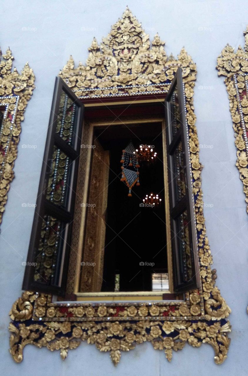 wooden worked window.