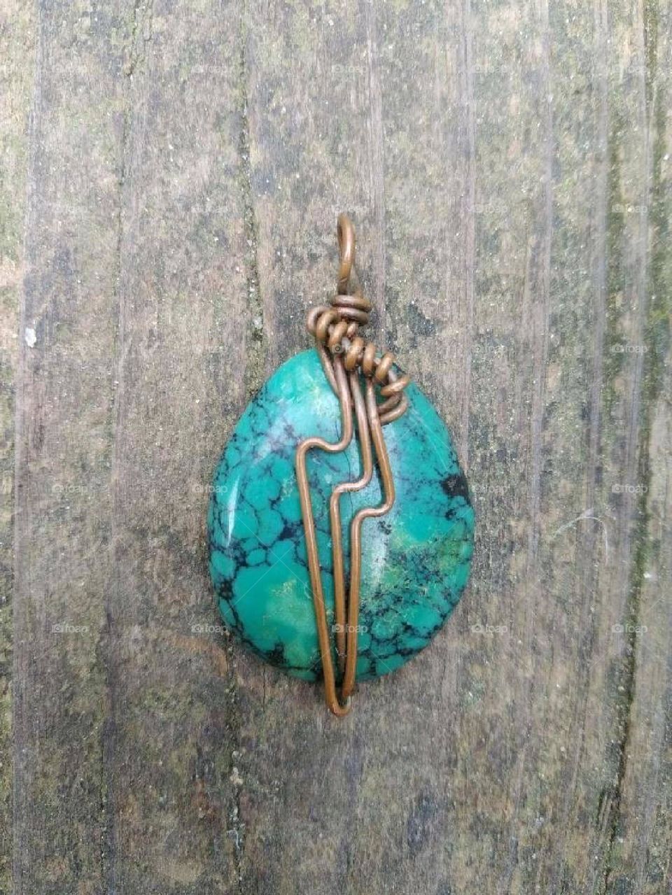 Turquoise wrapped in copper