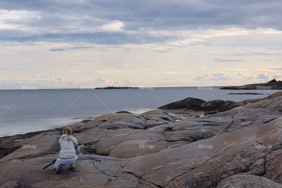 Woman photographer on the clif