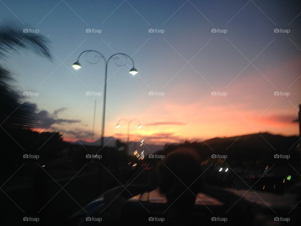 A shaky sunset image from the back of a truck in the Philippines 