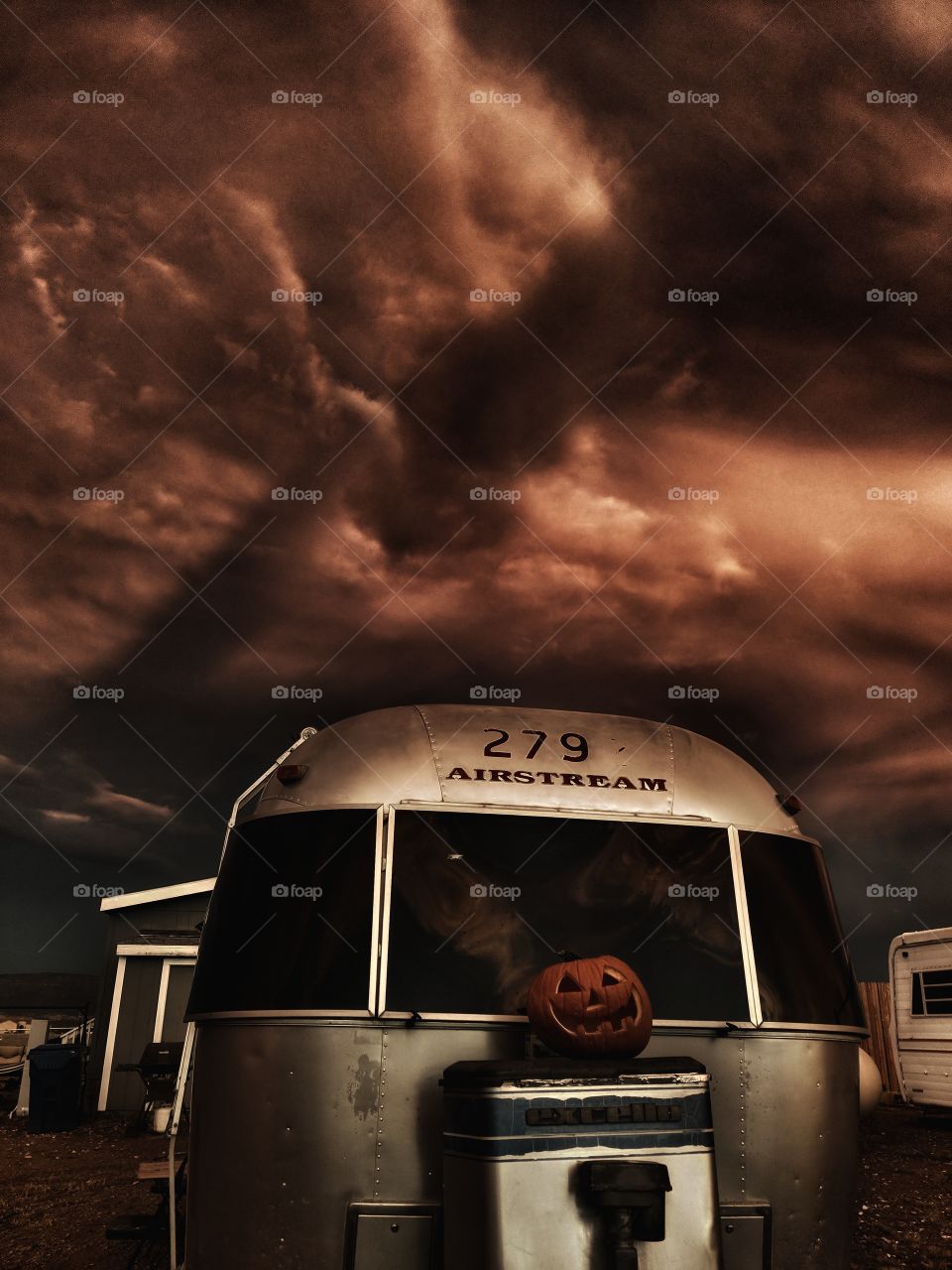 Autumn Airstream after the storm beneath apocalyptic skies.