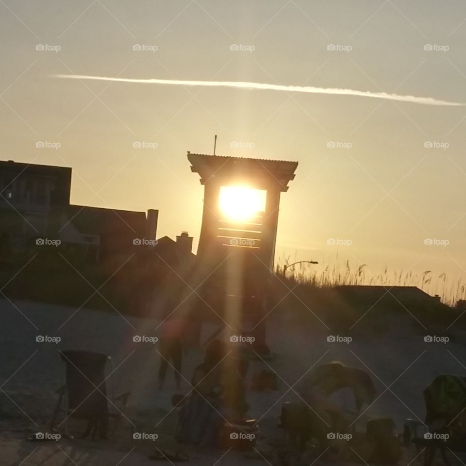 Sunset through the lifeguard stand.