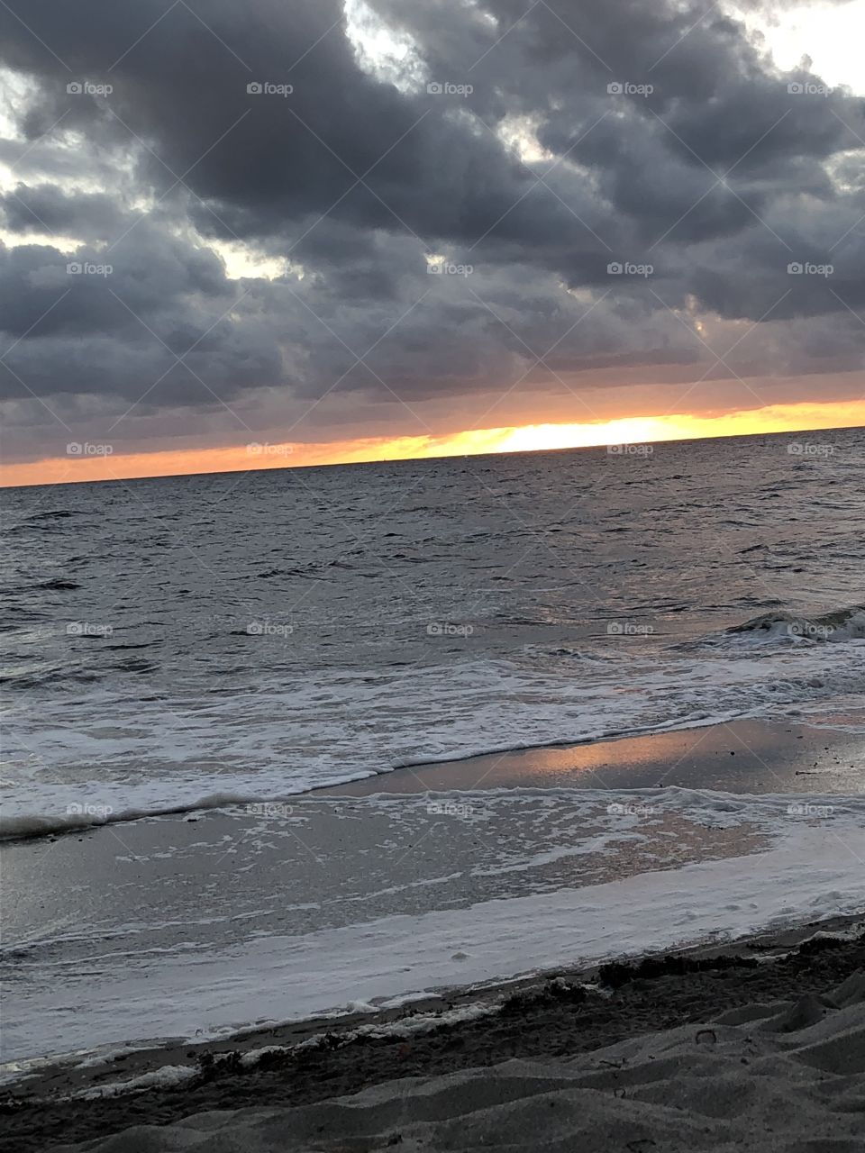 Sun rising off the ocean