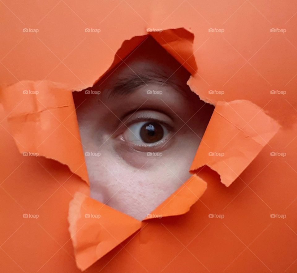 Portrait of a peeping eye